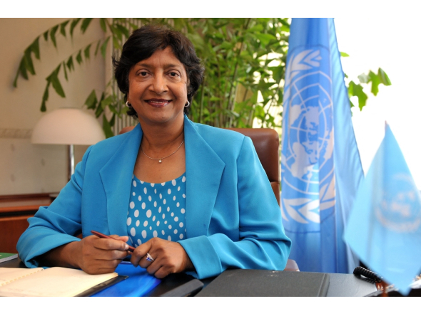(FILES) New United Nations High Commissioner for Human Rights, South African judge Navanethem (Navi) Pillay poses in her office at the Palais Wilson, headquarters of the specialised UN agency as she takes up her post on Spetember 1, 2008 in Geneva. (Photo by Fabrice COFFRINI / AFP)