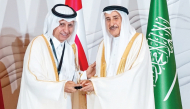 Deputy Prime Minister of the Kingdom of Bahrain H E  Sheikh Khalid bin Abdullah Al Khalifa presenting the award to Chairman of the Board of Directors of QCS Sheikh Dr. Khalid bin Jabor Al Thani. 
