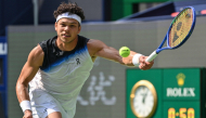 USA's Ben Shelton hits a return to France's Arthur Gea during their men's singles match at the Shanghai Masters tennis tournament in Shanghai on October 11, 2026. (Photo by Hector Retamal / AFP)
 