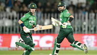 Pakistan’s captain Sahibzada Farhan (right) and Maaz Sadaqat run between the wickets during the second T20I.