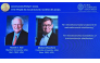 The winners of the 2026 Sveriges Riksbank Prize in Economic Sciences in Memory of Alfred Nobel, Robert E Hall (L) and Michael Woodford, are displayed on a screen at the Royal Swedish Academy of Sciences in Stockholm on October 12, 2026. Photo by Anders Wiklund / TT NEWS AGENCY / AFP 