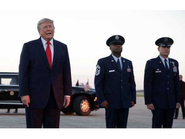 US President Donald Trump talks with members of the media after landing at Youngstown Air Reserve Station on October 12, 2026 in Vienna, Ohio. Alex Wong/Getty Images/AFP