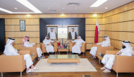 Officials from the two entities during a meeting in Doha