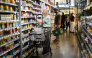 People shop for groceries at a supermarket in Manhattan on August 25, 2026 in New York City. US consumer inflation climbed more than anticipated in September, government data showed October 14, 2026, as the US war with Iran pushed energy costs higher, deepening strains on American households ahead of next month's midterm elections. The consumer price index (CPI) was slightly hotter than analysts expected, rising to 3.7 percent on a year-on-year basis, said the Department of Labor. This was an acceleration from 3.4 percent in August. (Photo by ANGELA WEISS / AFP)

