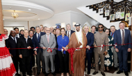 Head of Mission at the Embassy of Honduras H E Sophia Escobar Lanza (centre); and  AFCD Founder and Patron Farhan Al Sheikh Al Sayed with ambassadors and diplomats inaugurating the ninth edition of the Art, Fashion and Cultural Diplomacy exhibition, yesterday. Pic: Salim Matramkot/THE PENINSULA 