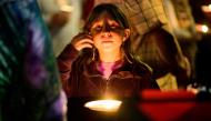 Community members grieve during a candlelight vigil at Peace Corner on October 16, 2026 in Bend, Oregon. Mathieu Lewis-Rolland/Getty Images/AFP