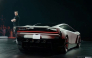 A grab taken on October 16, 2026 from a live feed released by Tesla shows Tech billionaire Elon Musk unveiling on October 15 the next-generation Roadster electric car in McGregor, Texas, United States. (Photo by Tesla / AFP)