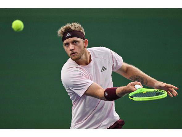 Spain's Alejandro Davidovich Fokina hits a return to Germany's Alexander Zverev during their men's singles semi-final match at the Shanghai Masters tennis tournament in Shanghai on October 17, 2026. (Photo by Hector Retamal / AFP)