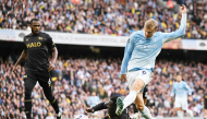 Erling Haaland (right) shoots to score Manchester City’s third goal.