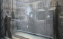 This photograph shows the damaged shop windows of the jeweller 