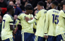 Arsenal's English midfielder #20 Noni Madueke (2L) celebrates scoring the team's first goal with teammates during the English Premier League football match between Nottingham Forest and Arsenal at The City Ground in Nottingham, central England, on October 18, 2026. (Photo by Darren Staples / AFP) 
