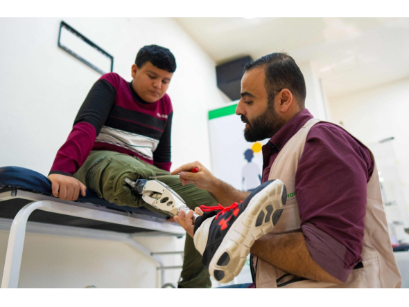 Mahmoud Abou Nusair has his prosthetic attached at a medical centre in Amman on October 13, 2026 as part of the 