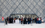 Protesters, including students from the Ecole du Louvre, block the entrance to the Louvre Museum in Paris on October 19, 2026. (Photo by Dimitar Dilkoff / AFP)