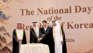 Minister of Justice and Minister of State for Cabinet Affairs H E Ibrahim bin Ali bin Issa Al Hassan Al Mohannadi (first right); Minister of State for Foreign Trade Affairs at MoCI H E Dr. Ahmad bin Mohammed Al-Sayed (third right); Director of Department of Protocol at MoFA H E Ibrahim Yousif Abdullah Fakhro, and Ambassador of the Republic of Korea to Qatar H E Hong Jeepio during the cake cutting to mark National Day of the Republic of Korea, in Doha, yesterday.