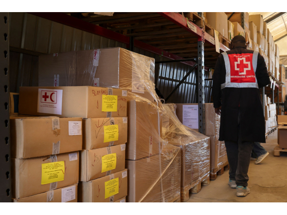 Kenya Red Cross warehouse personnel inspect batches of medical kits before before deployment as efforts to contain rising cases of Ebola ramp up in the Kenyan capital Nairobi on October 19, 2026. (Photo by Tony KARUMBA / AFP)
