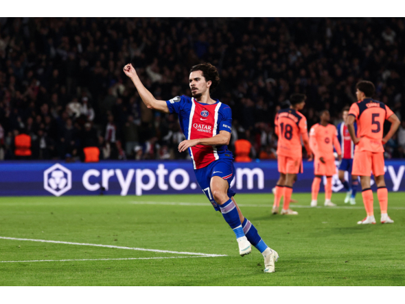 PSG's Portuguese midfielder #17 Vitinha celebrates after scoring his team third goal during the UEFA Champions League first round day 3 football match between Paris Saint-Germain (PSG) and FC Barcelona at the Parc de Princes stadium in Paris on October 20, 2026. (Photo by FRANCK FIFE / AFP)