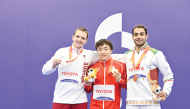 Qatar's Shamil Shahov (left) with gold winner Genki Saito of Japan and bronze medallist Abadi Karimi Jahan of Iran during the men’s 100m breaststroke (SB12) podium ceremony.