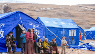 People are seen at a temporary resettlement site of an earthquake-hit village in Maru Township of Baqen County, Nagqu City, southwest China's Xizang Autonomous Region, (Xinhua/Tenzin Nyida)
 