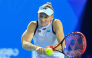 Kazakhstan's Elena Rybakina hits a return to Russia's Diana Shnaider during their women's singles semifinal match at the Ningbo Open tennis tournament in Ningbo, China's eastern Zhejiang province on October 24, 2026. (Photo by CN-STR / AFP) 
