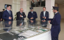 Minister of Security and the Interior of Belgium H E Bernard Quintin being briefed during the visit. 