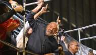 Brazil's President and presidential candidate Luiz Inacio Lula da Silva gestures to supporters after winning the presidential runoff election in Sao Paulo, Brazil, on October 25, 2026. (Photo by Juan Barreto / AFP)