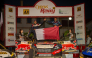 Qatar's Nasser Al-Attiyah and his Spanish navigator Candido Carrera celebrate their victory.  