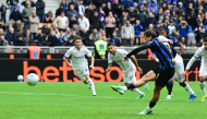 Inter Milan’s Piotr Zielinski shoots from the penalty spot to score a goal.