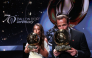 Spain and Barcelona midfielder Alexia Putellas and England and Bayern Munich forward Harry Kane kiss their trophies on stage after receiving their Ballon d'Or awards on October 26, 2026. (Photo by Franck Fife / AFP)