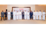 Chief of Compliance and Anti Financial Crimes at QIIB Mohammad Rifaie with other officials during the event.