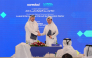Lusail International Circuit Shared Services Executive Director Abdulrahman Hassen Al Mulla (right) and Ooredoo Qatar Chief Strategy and Digital Transformation Officer Thani Ali Al-Malki shake hands after announcing the partnership.