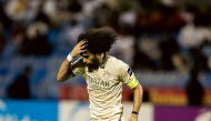 Al Sadd's Akram Afif celebrates after scoring a goal against Al Qadsiah, yesterday.
