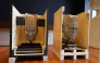 This photo shows two Chinese cultural relics, the head of a military official statue (L) and the head of a civil official statue, returned from Australia, in Canberra, Australia. (Photo by Chu Chen/Xinhua) 