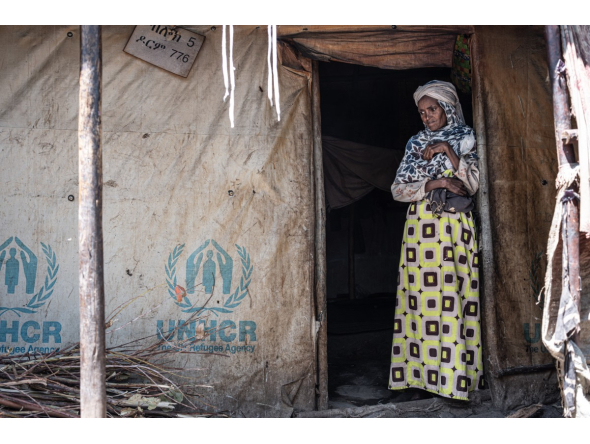 Representational photo showing a displaced Amhara woman stands at the entrance of her tent at the crowded Bakelo Camp for internally displaced people in Debre Berhan, on October 19, 2026. (Photo by Marco Simoncelli / AFP)