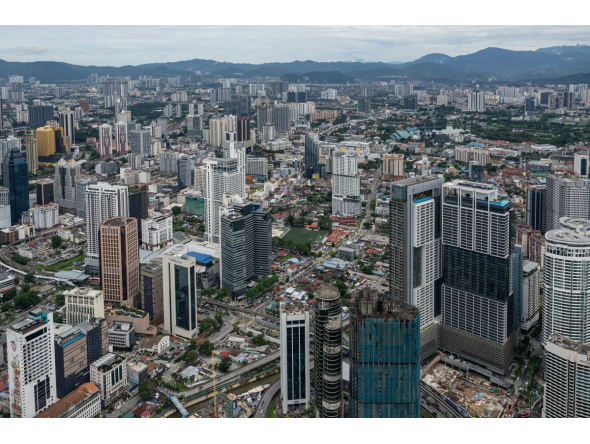 Commercial buildings are seen in Kuala Lumpur on October 26, 2026. Photo by MOHD RASFAN / AFP