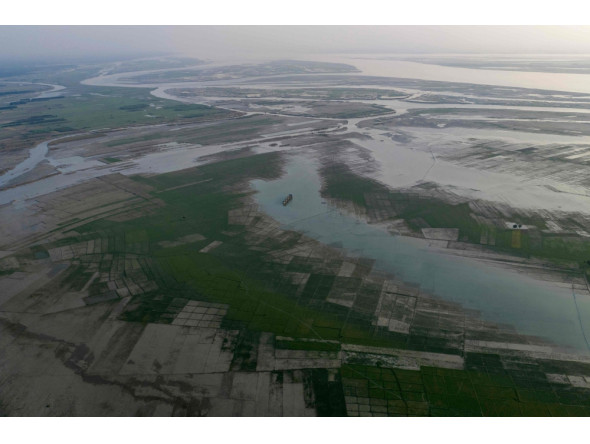 This aerial photograph taken on October 13, 2026, shows wetlands along the Padma river at Ujirpur, near the Bangladesh-India frontier in Bangladesh's Rajshahi division. (Photo by Salahuddin Ahmed / AFP)