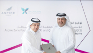 Chairman of Qatar Cancer Society H E Sheikh Dr. Khalid bin Jabor Al Thani with Acting Chief Executive Officer of Aspire Zone Foundation Abdulla Nasser Al-Naemi during the signing ceremony.