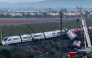 Investigators survey debris amongst the damaged carriages of a train crash between two high-speed units, a Renfe AVE train and an Iryo train around 150 km south of Madrid between Urda and Los Yebenes in the province of Toledo, a day after the accident on October 29, 2026. Photo by OSCAR DEL POZO / AFP