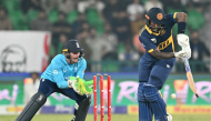 Sri Lanka's Avishka Fernando (R) plays a shot during the one-day international (ODI) tri-series cricket match between England and Sri Lanka at the Gaddafi stadium in Lahore on October 29, 2026. (Photo by ARIF ALI / AFP)