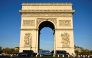 Gendarmes' vehicles surround the Arc de Triomphe in Paris on October 31, 2026. (Photo by Julien De Rosa / AFP)