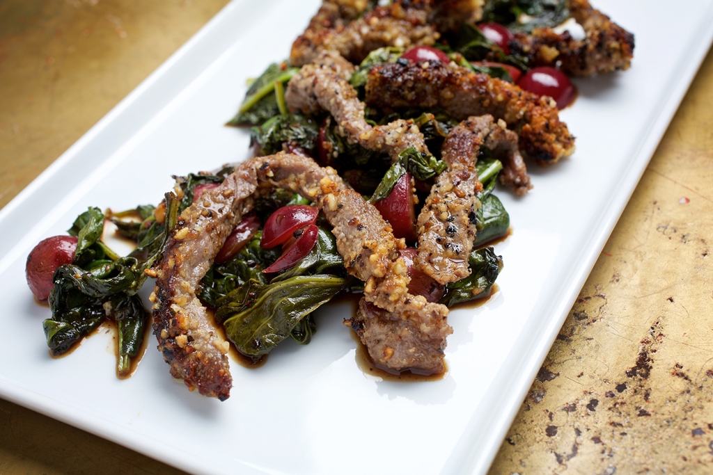 Nut-Crusted Sirloin Strips With Grapes. (Photo by Deb Lindsey for The Washington Post)