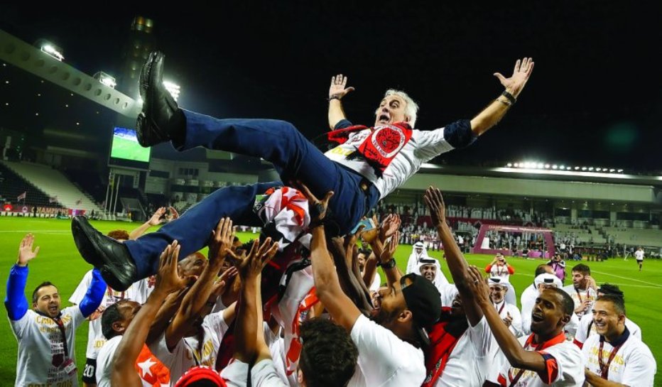 Al Rayyan players throw coach Jorge Fossati in the air during the celebrations after winning the Qatar Stars League in this file photo.