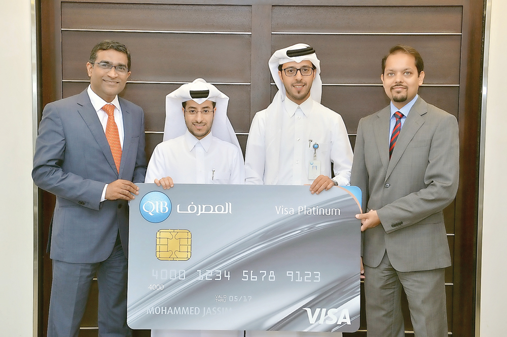 Top executives of QIB and Visa at the launch event.