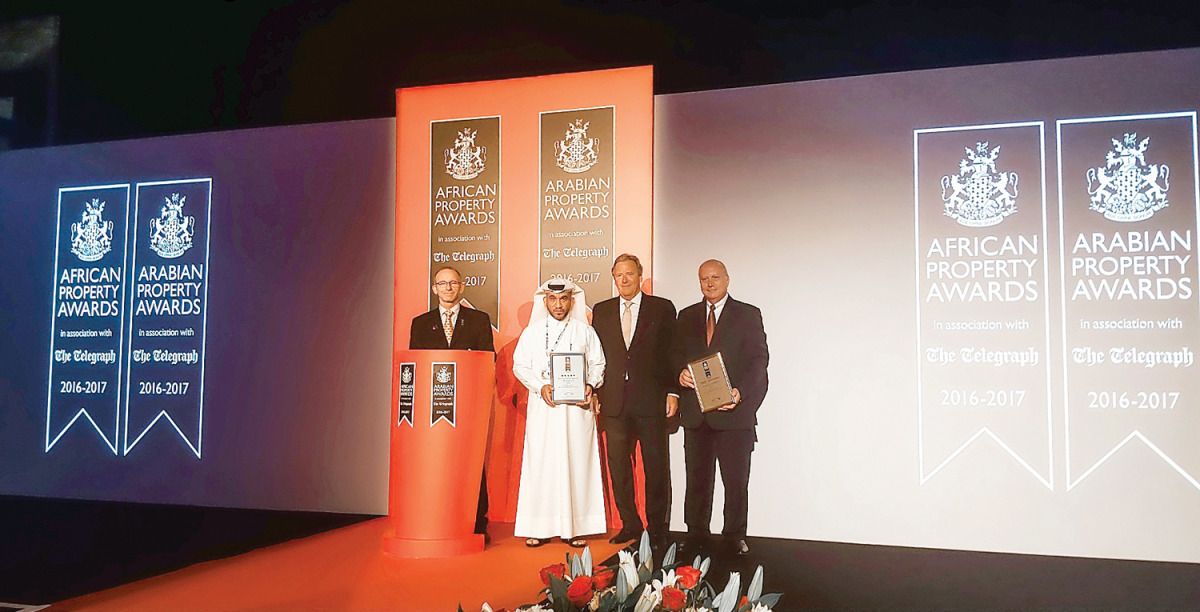 UDC senior representatives with the awards at the event. 