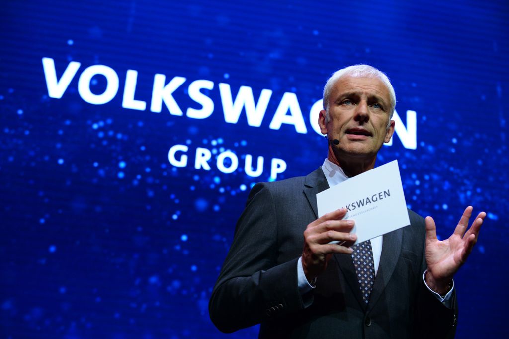 Matthias Mueller, Volkswagen chief and board member of German company Porsche SE, addresses the Volkswagen Group Night in Paris on September 28, 2016 prior to the opening of the Paris Motor Show to the press. / AFP / ERIC PIERMONT