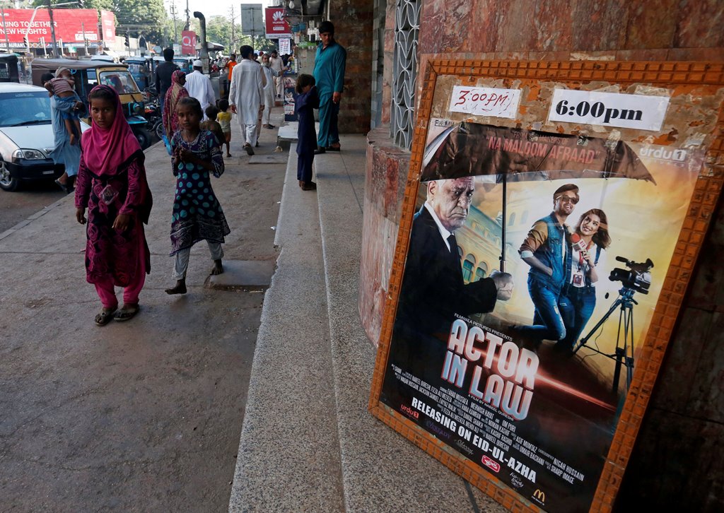 An advertising poster for a Pakistani film with Indian actors is seen outside a movie theater in Karachi, Pakistan, September 30, 2016. Reuters/Akhtar Soomro
