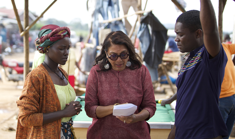 Mira Nair (C) on the movie set.