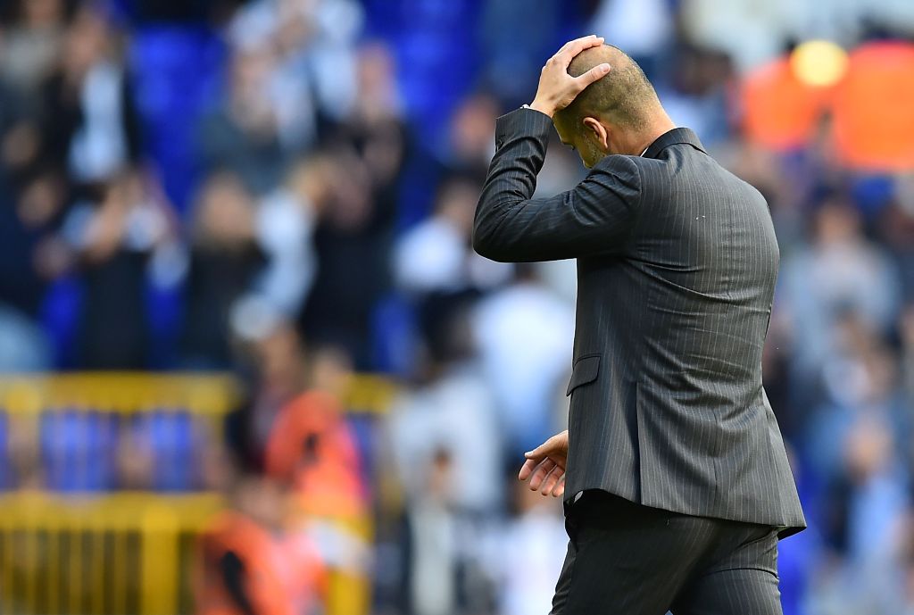 Manchester City's Spanish manager Pep Guardiola reacts after the English Premier League football match between Tottenham Hotspur and Manchester City at White Hart Lane in London, on October 2, 2016.  AFP / Glyn KIRK