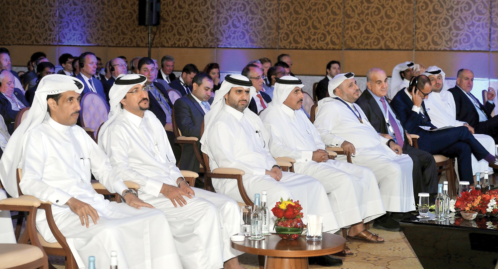 H E Sheikh Abdulla bin Saud Al Thani, (fourth left) Governor of Qatar Central Bank; Sheikh Nasser bin Ali Al Thani (fifth left) Chairman of Qatar General Insurance and Reinsurance Company, and other officials during the opening of the 49th International A