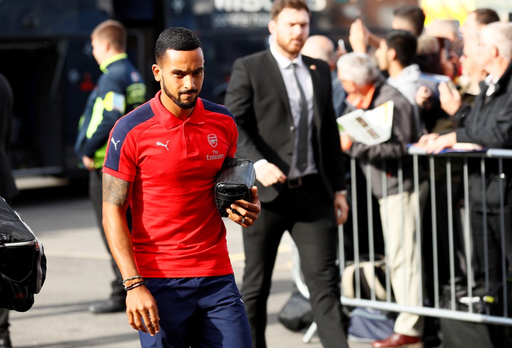 Arsenal's Theo Walcott arrives before the match. Reuters / Jason Cairnduff