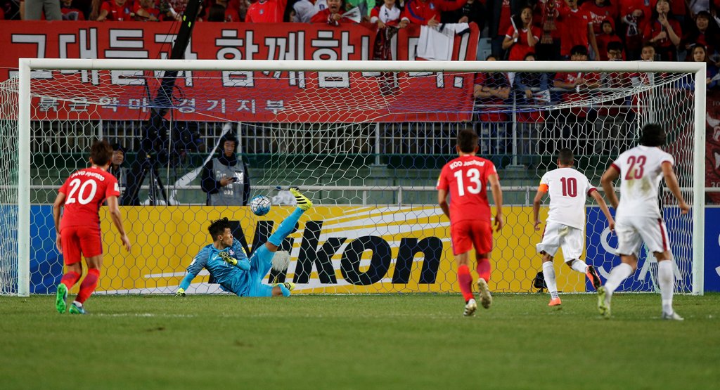 Suwon, South Korea - 06/10/16 - Hasan Al Haydos (2nd R) of Qatar scores a goal. REUTERS/Kim Hong-Ji
